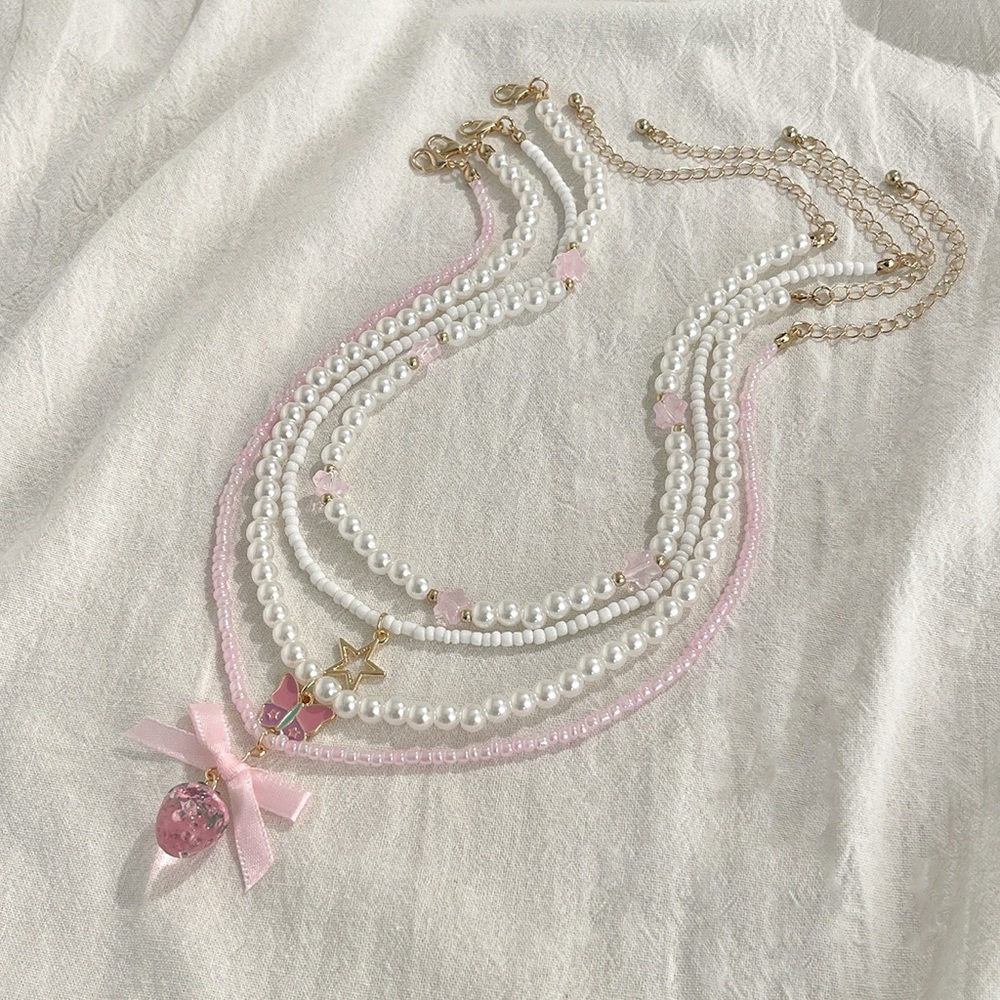 Zara Pink Pearl Layered Necklace with Strawberry & Butterfly Charms - Picture 2 of 2